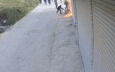 Settlers set fire to a Palestinian warehouse in Asira al-Qibliya, near Nablus in the northern West Bank, April 17, 2026. (Screen capture: X, used in accordance with Clause 27a of the Copyright Law)